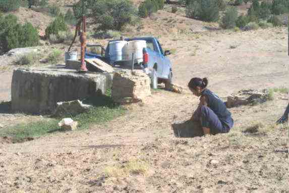 photo of woman at the well